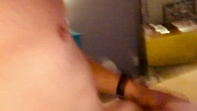 One hand on the camera, the other palming the booty