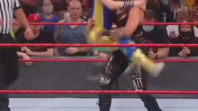 Love the way Nikki wraps herself around Rhea and gets carried around