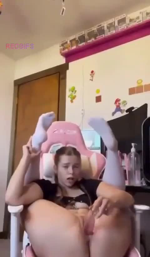 Cute teen playing with her dildo