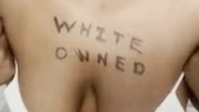 Nothing more than a white owned black slut!