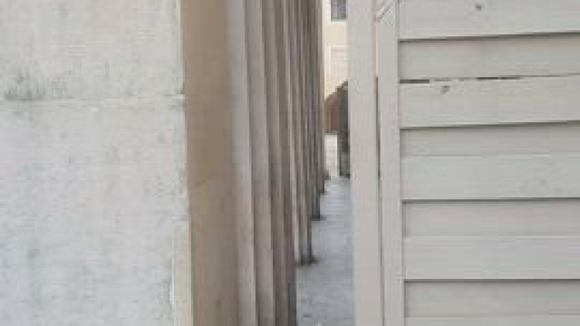 A small show in front of the entrance to one of the restaurants in the old town 