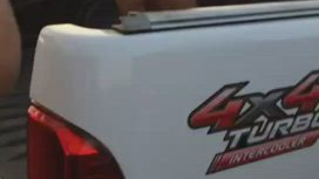 Baby dancing in the festival parking lot