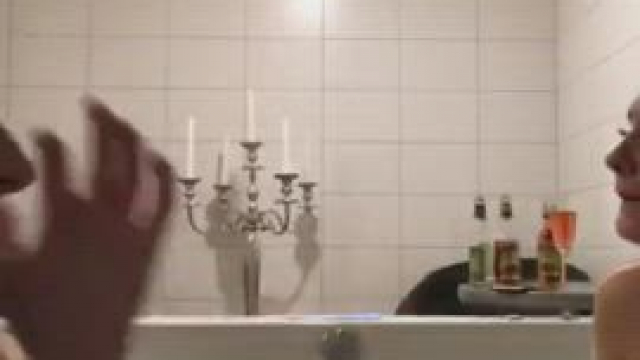 Busty Swedish Brunette Brings Candy and Bath Foam