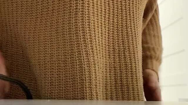 This sweater properly hides the goods 