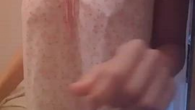 Lifting her nightgown