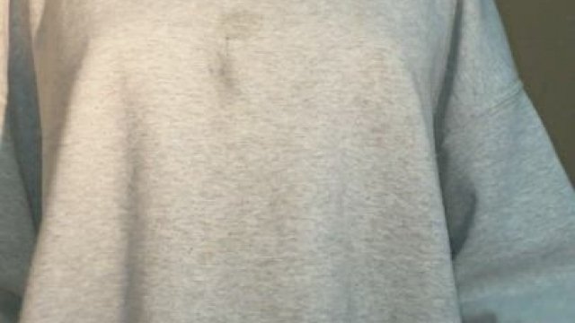 taking my big sweater off