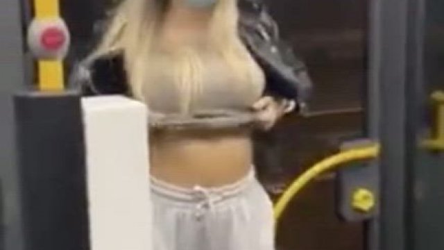 Lady flashing on bus