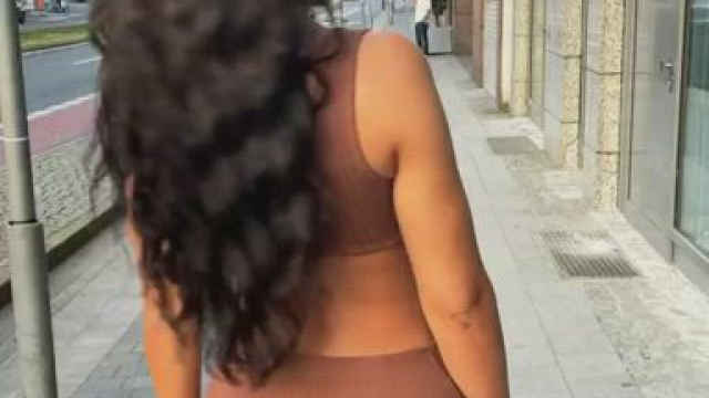 Beauty in a tight brown dress