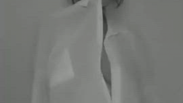 Korean dancing in a white shirt