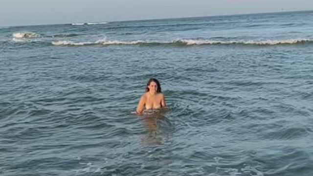 Cute 33yo housewife running with bouncing boobies on beach. Do you think I could be o