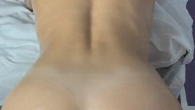 Oiled up and bouncing my ass up and down his cock