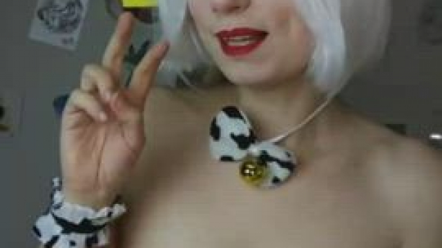 Painting Warhammer in my cow costume..