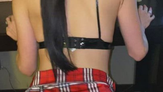 Riding with pigtails and a plaid skirt