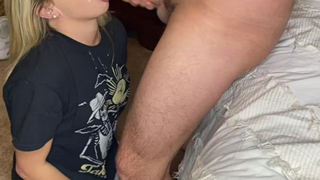 On my knees being sprayed with cum