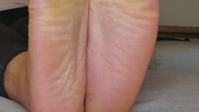 Spreading my toes and showing off my soles for you