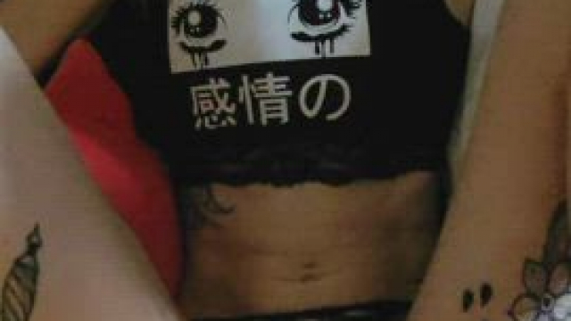 Hanging off the bed at a outstanding angle