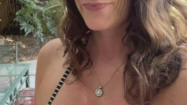 Average mom walking by the pool