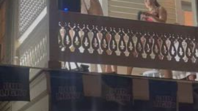 Getting flogged on a balcony at Fantasyfest