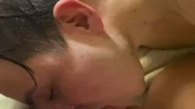 Cumshot on the wife and the cuck while they kiss