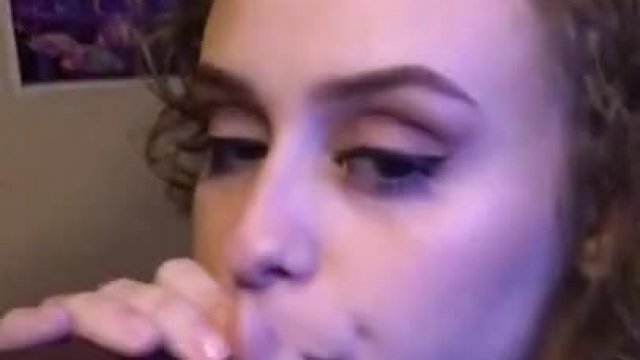 White girl sucks her man's black cock