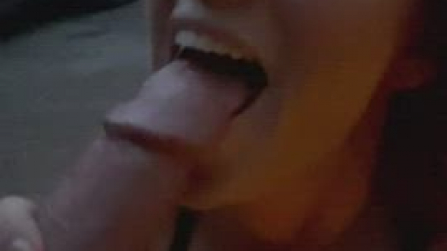 Sucking him dry in a parking lot