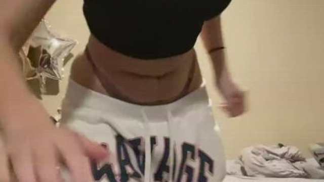 Watch her take off her clothes one by one.