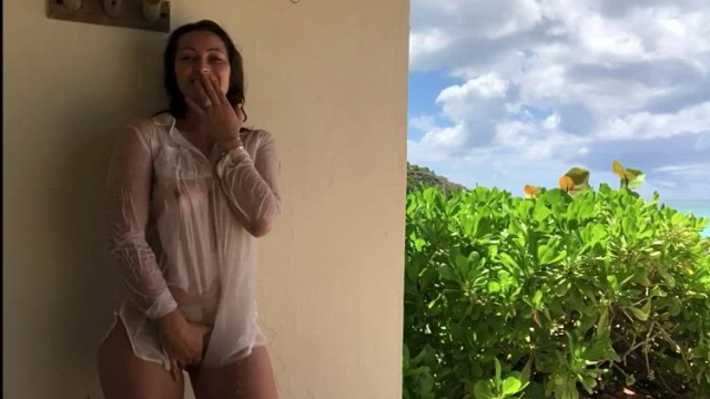 Dani under a beach shower