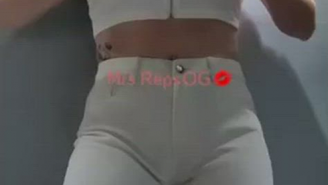 All in white…keep watching to see the zip come down