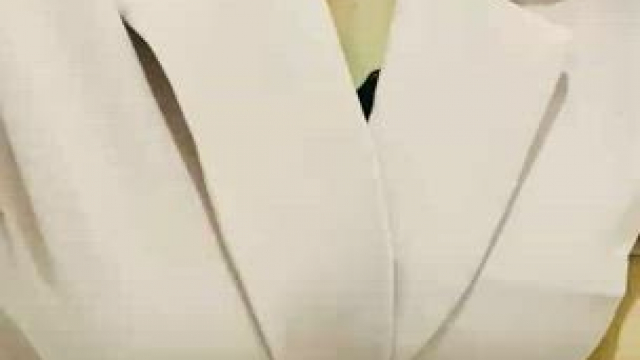 Been wanting to see the boss's big racks behind those blazers? I got you!