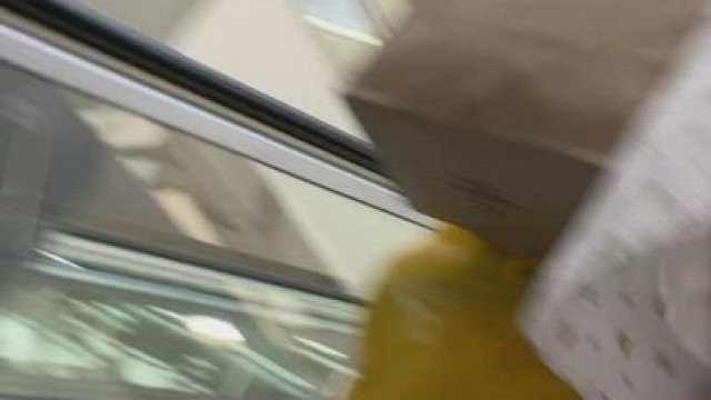 Going up the escalator in a dress