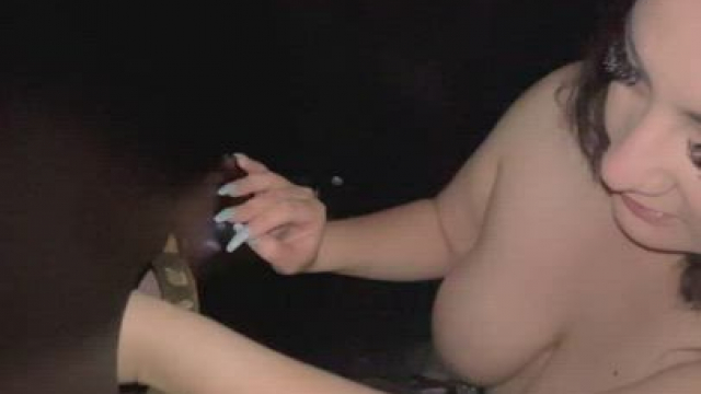 Sucking a stranger's dick at the gloryhole and letting him play with my tits [So