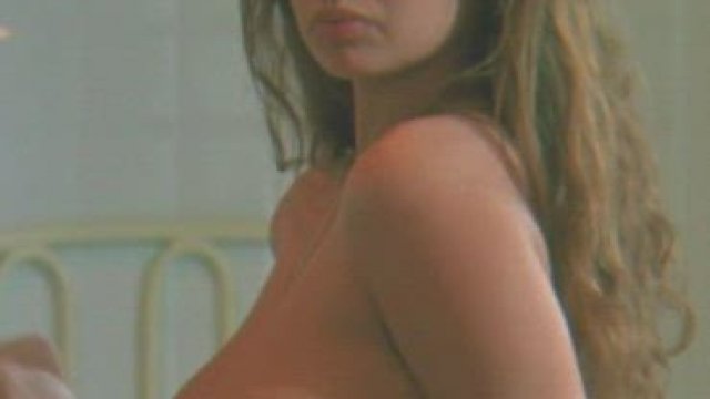 Debora Caprioglio - Huge tits in 'Paprika'