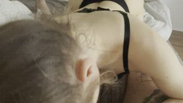 She is trying to make him happy