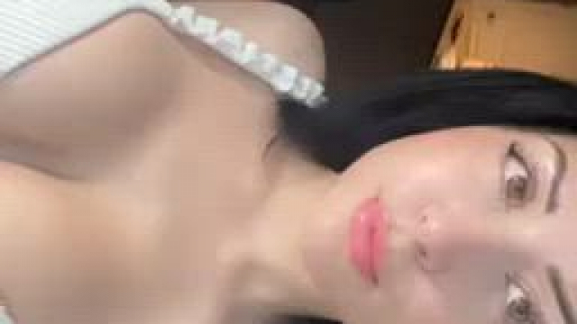 I love a white bikini top against my tanned implants.