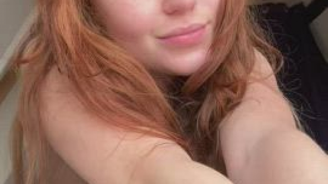 Readhead babe showing her natural boobies