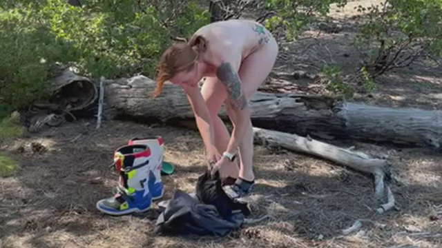 Getting dressed after a little break to get naked on the trail ride.