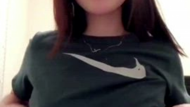 Cute Japanese girl with glasses flashes her tits