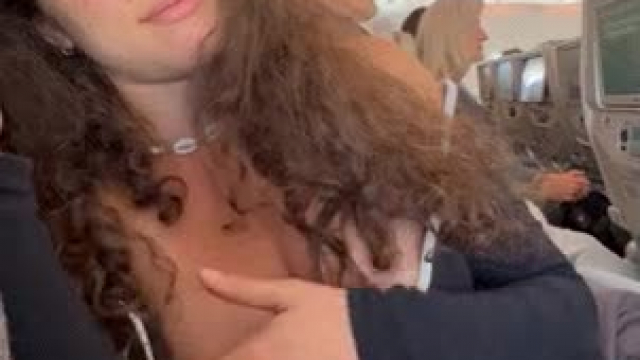 Getting my tits out on my latest flight [GIF]