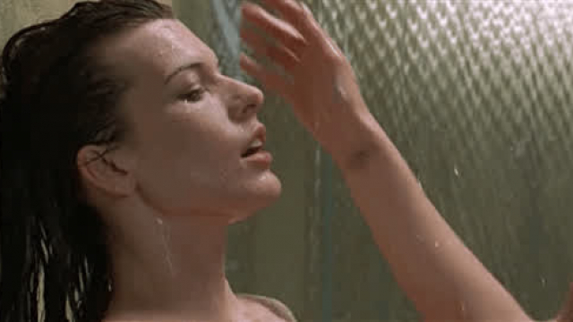 Milla Jovovich and Sarah Strange (and a dude) have a shower subplot in .45