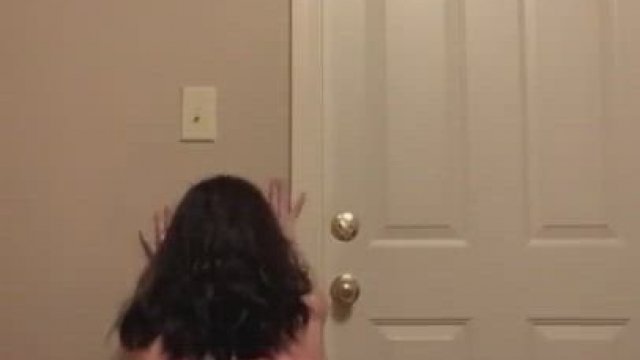 Using the wall to get pounded.