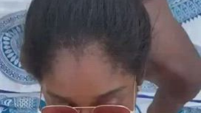 Blowjob on a crowded beach