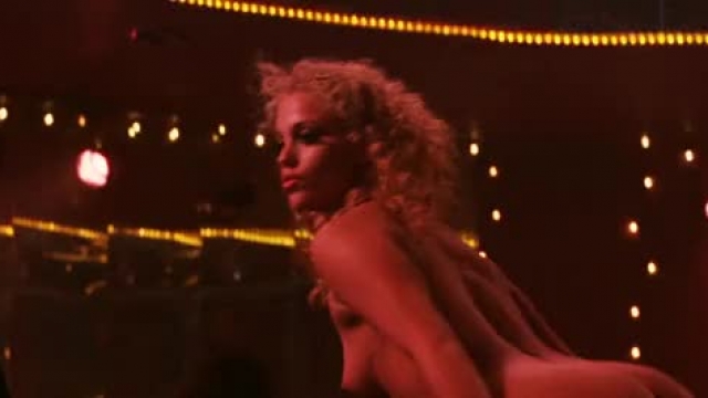Watch "Elizabeth Berkley keeps the plot moving in "Showgirls"...