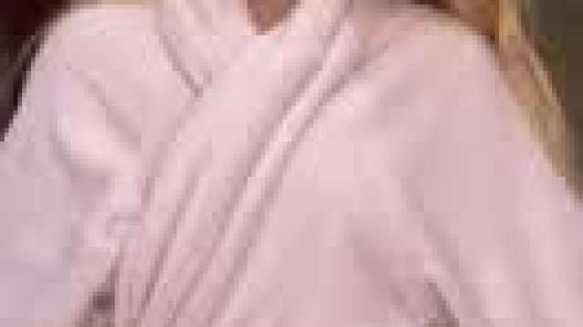 I’m a lot more smiley when the dressing gown comes off