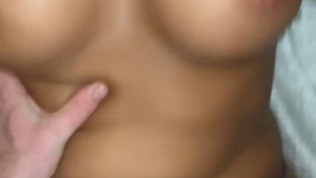 Spraying cum all over her perfect tits