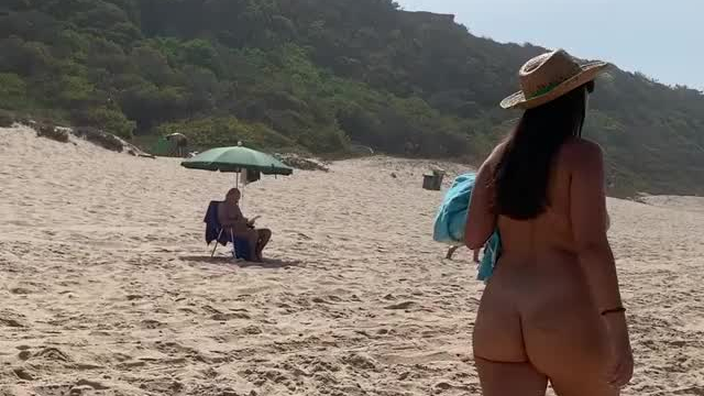 Going naked for a walk at the beach