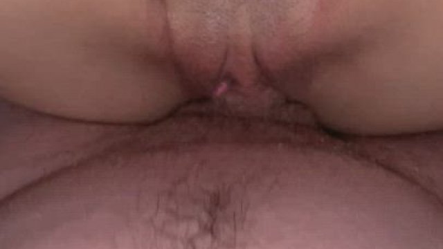 Touching her belly button from the inside