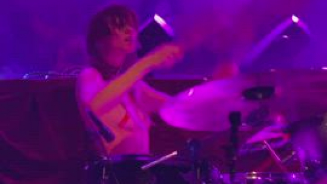 Emily Moon topless w/nipple tape drumming