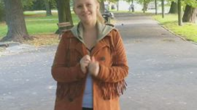 Simply put, a humble student walking in a city park after lectures. Heh