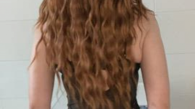 Here's your redhead ready to give a big serve..