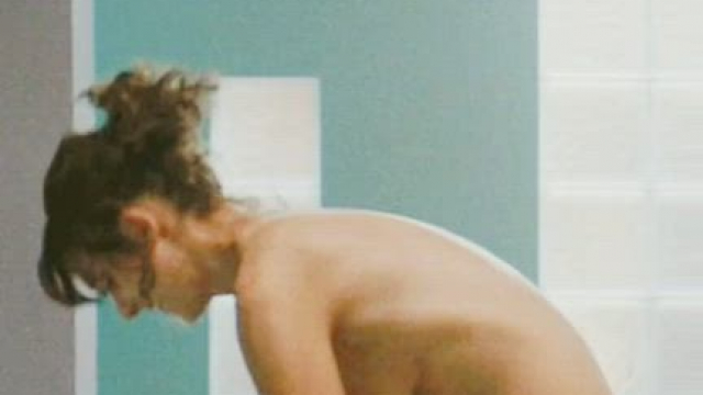 Alison Brie undressing in 